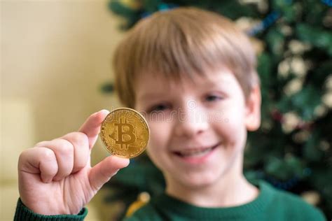 One Bitcoin In The Hand Of Young Boy Concept Stock Photo Image Of
