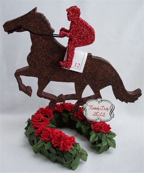 Kentucky Derby Themed Centerpieces With Horse Jockey Trophy And Roses