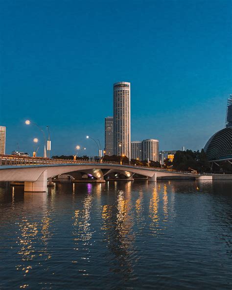 City Skyscrapers Bridge Water Lights Twilight Hd Phone Wallpaper