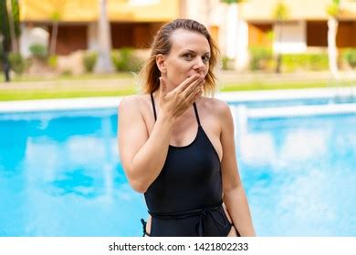 Blonde Woman Bikini Pool Making Surprise Stock Photo
