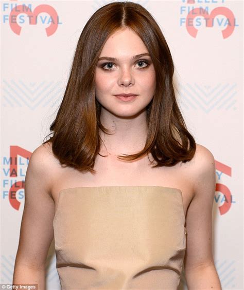 Elle Fanning In Taupe That Highlights New Brunette Hair Promoting Low