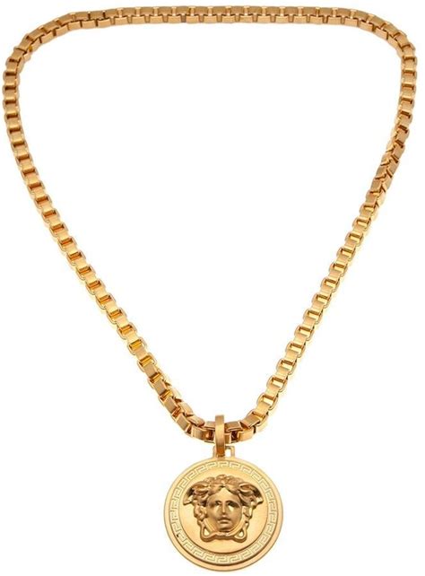 Skewing from simple and understated to raw and rugged, designer men's jewelry is a subtle yet indispensible addition to any considered aesthetic. Versace medusa medallion necklace, Gold-tone metal ...