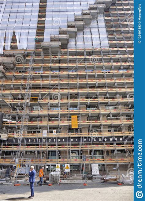 Building Facade Renovation With Wide Scaffolding Structure Editorial