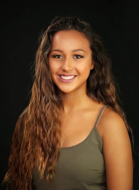 Portrait Of A Tanned Pretty Young Girl With A Smile Stock Image