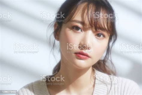 Soft Focused Beauty Portrait Of Young Asian Woman On The Light And