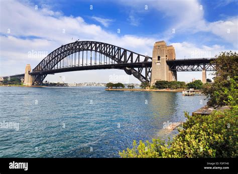 Side View Of Sydney Harbour Bridge From Milsons Point On Bright Summer