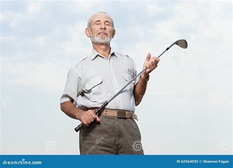 Man Holding A Golf Club Stock Image Image Of Leisure