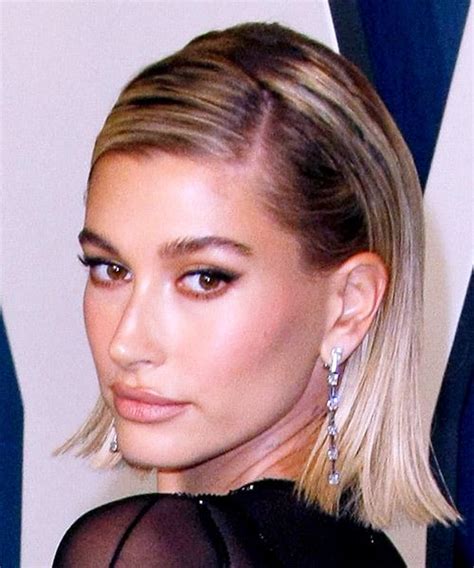 hailey baldwin medium straight layered dark brunette bob haircut with light blonde highlights