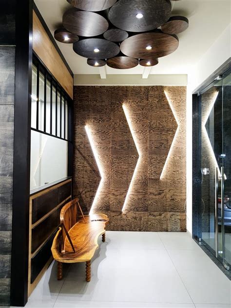 Veneershowroomfoyerentrancepatternwoodenbenchsittinglighting