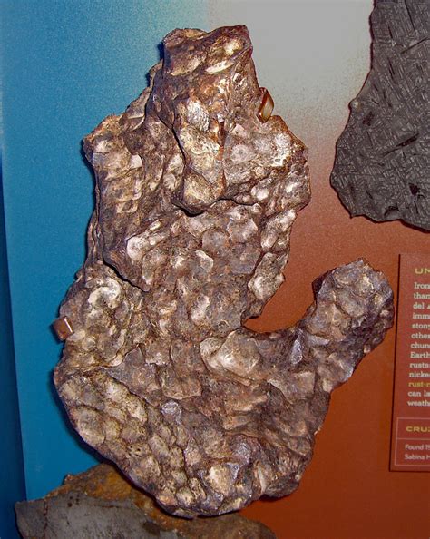 When the original object enters the atmosphere, various factors such as friction, pressure, and chemical interactions with the atmospheric gases cause it to heat up and radiate energy. MPOD 171026 from Tucson Meteorites