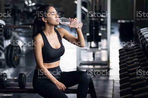 Sporty Girl Drink Water After Dumbbell Exercise Stock Photo Download
