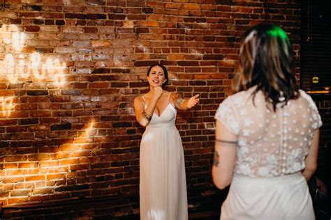 Emily And Robyn Dancing With Her A Modern And Intimate Diy Wedding