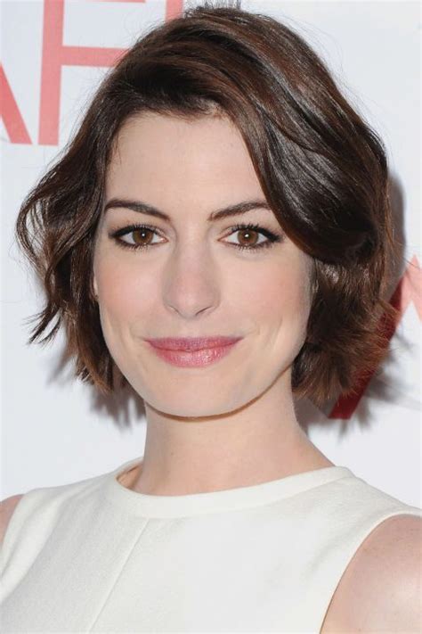 10 Ways To Style A Short Haircut Anne Hathaway Adds Soft Waves And A
