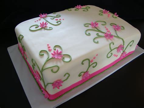 Floral cakes are fast becoming one of the top wedding cake trends of the year. Cakes By Crystal: Sheet Cakes and Cookie Cakes