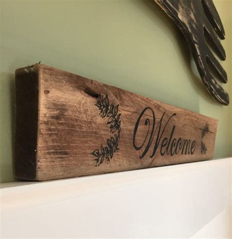 Rustic Welcome Sign On Reclaimed Wood