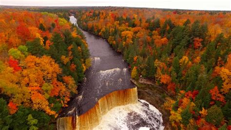 drone video shows fall colors at tahquamenon falls in paradise michigan youtube