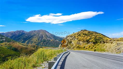 Empty Mountain Road Under Blue Sky And White Clouds Picture And Hd