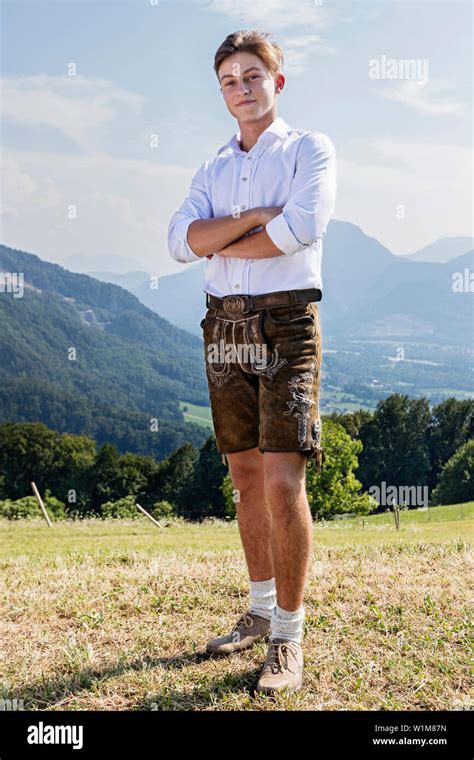 Teenage Boy Posing Outdoors In Traditional Bavarian Costume Bavaria