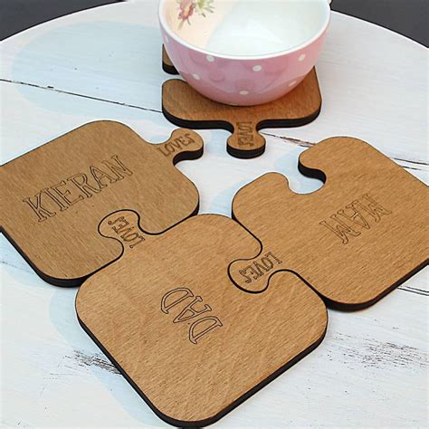 Four Personalised Wooden Jigsaw Coasters By Neltempo