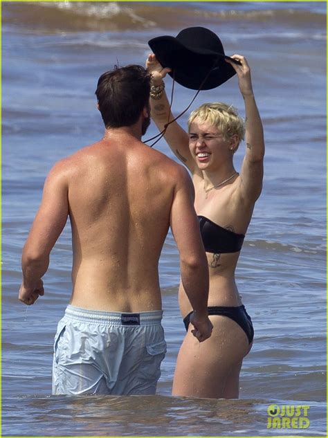 Miley Cyrus Flaunts Pda With Patrick Schwarzenegger In Hawaii Photo Bikini Miley