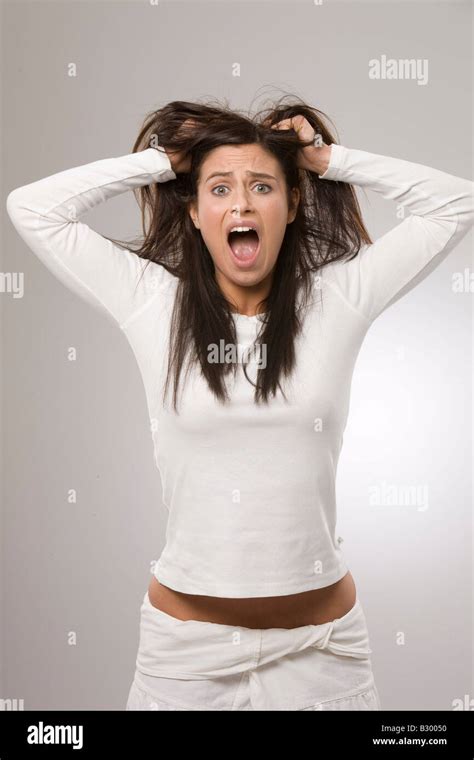 Woman Pulling Hair Stock Photo Alamy