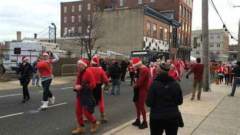 Thousands Of Santas Run In Philadelphia Running Of The Santas 2014