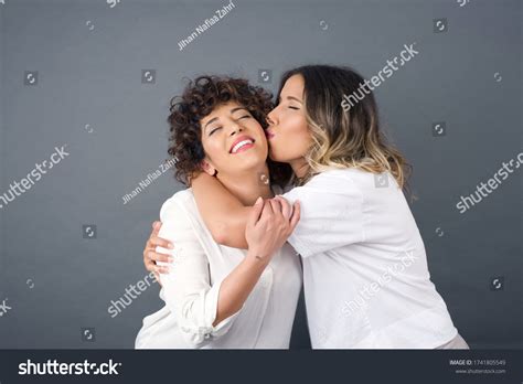 Affectionate Girl Kissing Her Best Friend Stock Photo Shutterstock