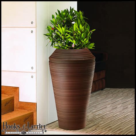 Get free shipping on qualified plant pots or buy online pick up in store today in the outdoors department. Fiberglass Planters, Resin Planter, Fiberglass & Resin ...