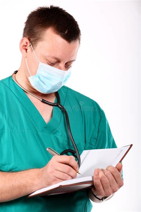 Medical Doctor With Stethoscope Writing Stock Image Image Of Intern
