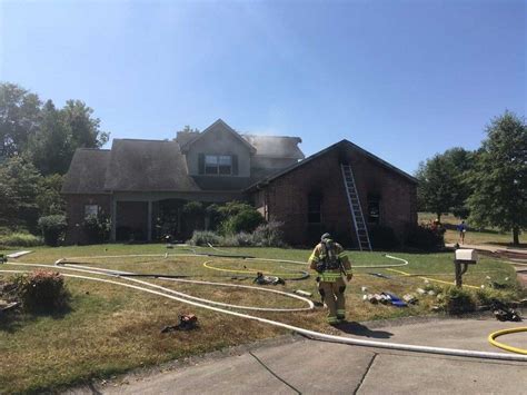 Firefighters Working To Put Out House Fire In Jackson