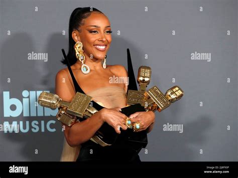 Doja Cat Poses With Four Awards In The Photo Room During The Billboard