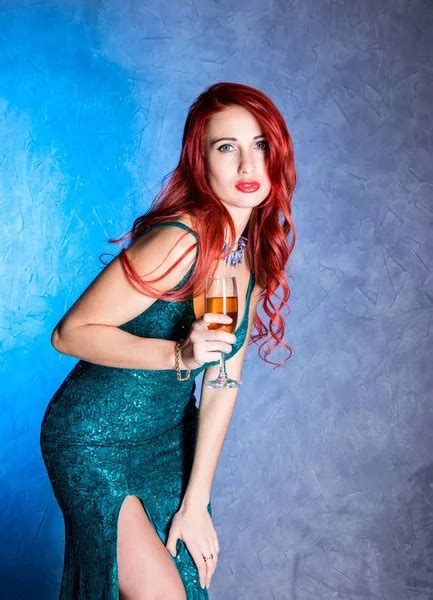 Elegant Sexy Woman With Big Boobs In Tight Blue Dress Holding Wineglass With Champagne Stock