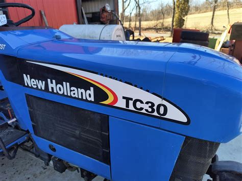 #8732 2004 New Holland TC30 4wd Tractor $9900.00 | JM Equipment