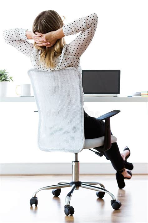 businesswoman stretching relaxing on moment in her office stock image image of moment