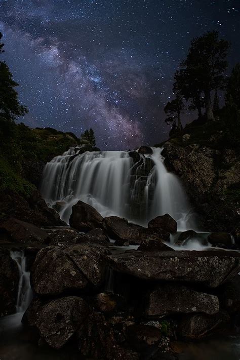 Waterfall At Night Under A Starry Sky Beautiful Pictures And Art