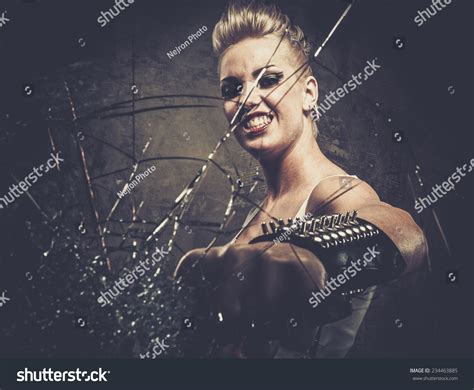 Punk Girl Breaking Glass With A Brass Knuckles Stock Photo 234463885