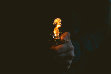 Person Holding Lighted Lighter Hd Wallpaper Peakpx