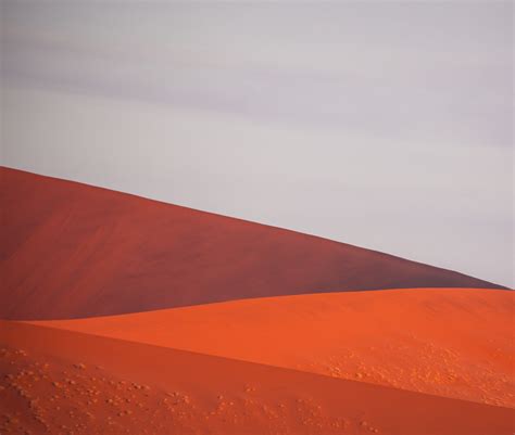 Taking Photos Of The Extraordinary Landscapes Among The Sand Dunes In