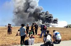 crash asiana flight airlines plane fire francisco san hospital who ntsb evacuate airport sfo liu yipeng initially pilot told crew