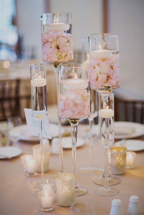 Modern Floating Candle Centerpieces | Flower centerpieces wedding, Candle wedding centerpieces ...