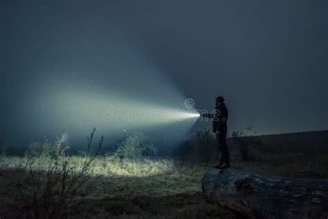 Searching With Flashlight In Outdoor Stock Photo Image Of Wilderness