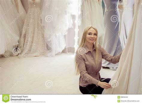 Beautiful Girl Chooses Her Wedding Dress Young Woman Entrepreneur