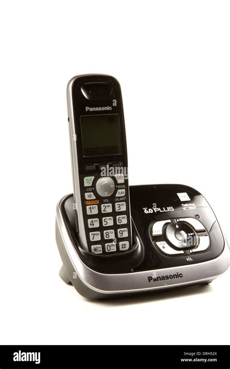 Old School Panasonic Cordless Phone And Charger On A White Background