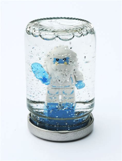 Construct A Snow Globe Using A Lego Figurine And Some Glitter 27
