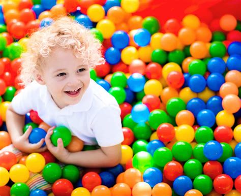 Child Playing In Ball Pit On Indoor Playground Playspace Design
