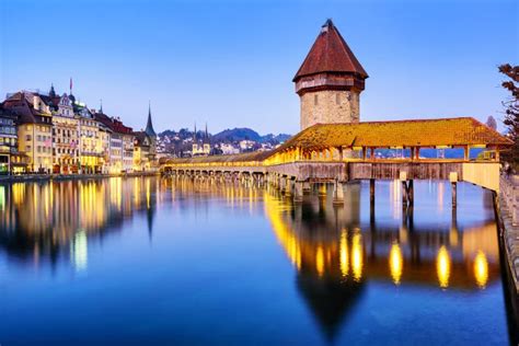 Chapel Bridge In Lucerne City Switzerland On A Blue Evening Stock