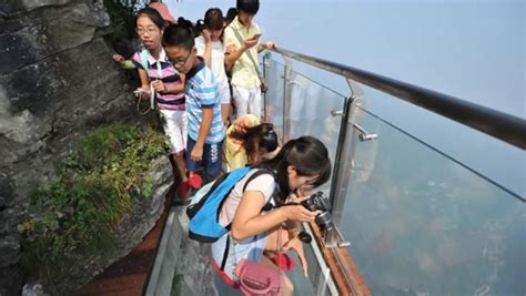 Coiling Glass Skywalk Opened In China Lets People Walk On