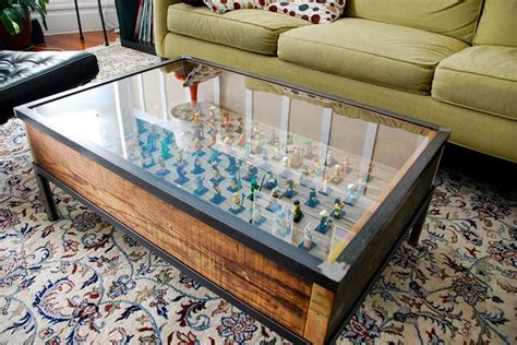 Whether sidled up beside your living room sofa or acting as a nightstand in the master suite, this end table offers space to stage and stow with style to spare. DIY display table (not Legos though) - this is definitely a great idea for a coffee table for my ...