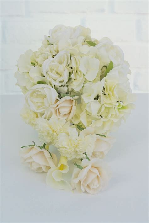 It will automatically hang from the bouquet in a cascade. Simple to Make Beautiful DIY Cascading Wedding Bouquet