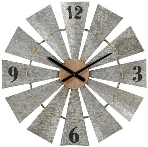 This oversized wall clock is inspired by a farmhouse windmill and features dimensional blades and rustic accents. Aspire Home Accents Marcel Windmill Wall Clock (With images) | Windmill wall clock, Wall clock ...